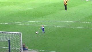 Crowd Cheers after Child Makes Goal