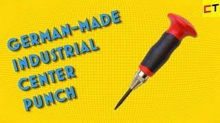 Spring-loaded self-striking center punch