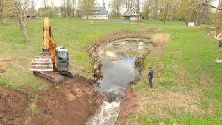 Removing A Pond Dam To Clean It Properly