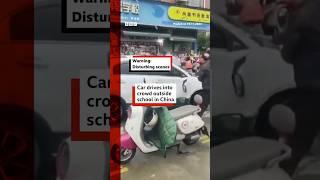 Car drives into crowd outside school in China. #China #Hunan #BBCNews