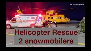 Helicopter Rescue of 2 snowmobilers by a CH-149 Cormorant.