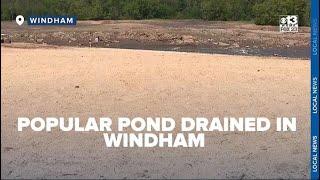 Popular swimming spot in Windham closed after company drains pond to repair dam