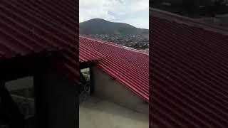 Installing the Roof at the Mano a Mano Office Building in Cochabamba, Bolivia