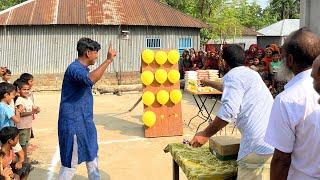 আজব খেলায় চাল, ডাল, তেল জেতার চ্যালেঞ্জ। তীর মেরে বেলুন ফাটিয়ে সবচেয়ে বেশি পুরস্কার কে জিতলো দেখুন ?