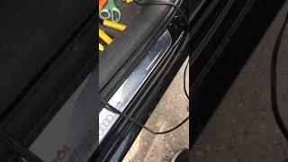 2009 Audi A4 illuminated LED door sills installation.