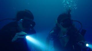 Scuba Diving Couple go diving at Night and discover a surprise