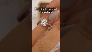 1 carat halo diamond ring on hand - cushion halo design with pave diamonds