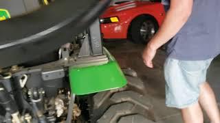 Taking the mower deck off a 2320 John Deere