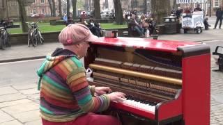 Busker playing "Your Song" in York