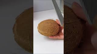 Easy trick to break a coconut