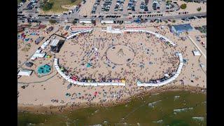 Thousands pack Lake Michigan beach for Burning Foot Beer Festival 2021