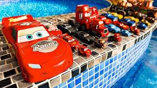 Disney Pixar Cars falling into deep pool, Lightning McQueen, Tow Mater, Mack, Sally, Francesco