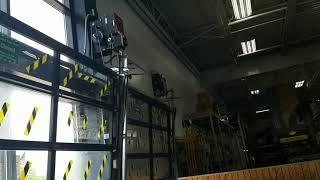 LiftMaster J501L5 and MJ5011U on Vertical Lift Full View Doors at Menards