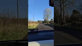 Driving on peaceful Irish countryroad