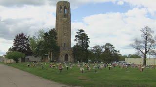 Dozens of Scouts lay 6,000 flags across graves of United States Veterans in Appleton ahead of Memori
