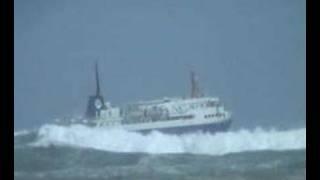 Ship departing Wellington into big swell