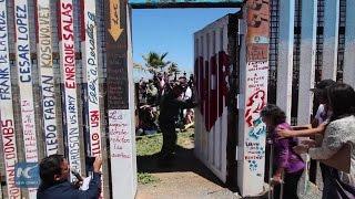 US Mexico border gate opens temporarily for Mexican families to meet and hug