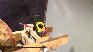 Homemade Neodymium Electric Generator,  produces 117 volts AC turning it by hand!