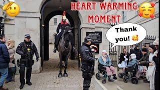 Armed Police Officer Shows Act Of Kindness As He Leads This Disabled Woman Towards The Horse Guard!