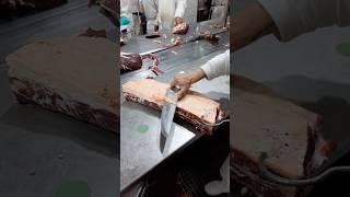 Trimming the fat on the meat production line with a very sharp knife!  With @juan.lombard0