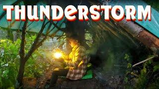 Bushcraft camping in a thunderstorm with a dog | surviving under a fallen | ASMR