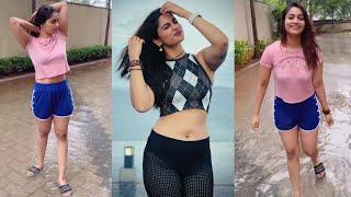 Shivani Narayanan Enjoying at Rain Photoshoot with Pink T shirt and Blue Shorts | Beach Fashion Look