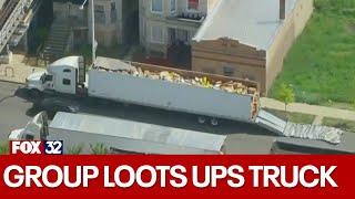 Group loots UPS truck after it strikes viaduct in Chicago