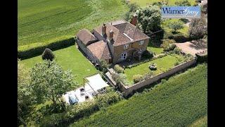 WarnerGray Estate Agents. Woodchurch, Kent.  Detached country property stunning countryside views.