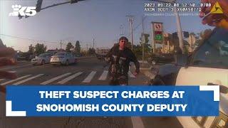 Theft suspect charges at Snohomish Co. deputy as he exits his cruiser