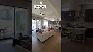 Primary Bedroom + Living Room of a $767,000 brand new home 30 minutes from Denver #LivingInDenver
