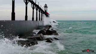 Waves Crashing Over Michigan City Lighthouse & Pier 4K Drone Footage