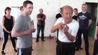 Sifu Lo Man Kam (nephew of Yip Man) demonstrate the One Inch Puch