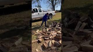 My wife splitting some wood she be chewing tobacco and climbing trees before long