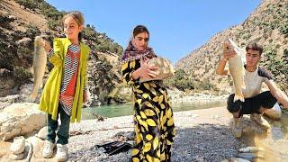 Fishing in the raging river by a nomadic girl