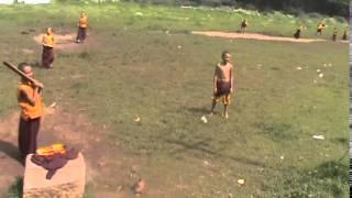 buddhist monks playing cricket