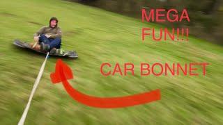 Sliding sideways on a car bonnet with Tom lamb and Colin furze.