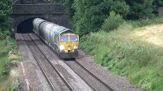 Planes, trains and...sheep. 66607 hauls empty cement wagons today