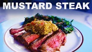 Sirloin steak with pickled mustard seeds and greens