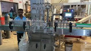 4 HEAD SERVO BASED LIQUID FILLING MACHINE FOR MUSTARD OIL , FLOOR CLEANER , HAND WASH & GELS