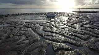 Point clear  st osyths  beach, featuring aviation museum , by drone footage uk