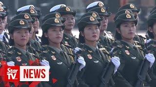 15 military units march in China's largest National Day parade