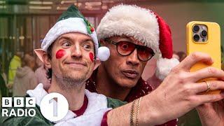 The Rock sings Christmas Carols with Greg James