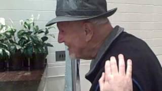 Jason Hurd speaking with WWII veteran During AFSC's "Cost Of War:Six Years Later" tour