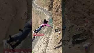 Cute girl bungee jumping