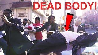 Funeral Director Takes Body Out Of The Coffin And Throws it On The Family Car