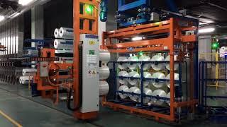 Bobbin doffing and packing system for large polyester plant