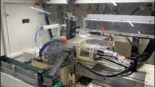 220 CNC avec prise de pièce sans centre et système de mesure in process et alimentation automatique.