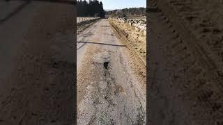 Post winter pot-holes in the Howe o' Cromar with Paul Anderson.