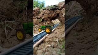 Train VS John Deere tractor