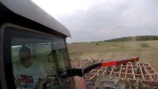 Massey Ferguson 8245 working the soil with the chisel plow